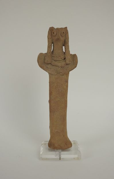 null Large avocephalus idol with joined hands and braids, low fired clay, circa 2nd...