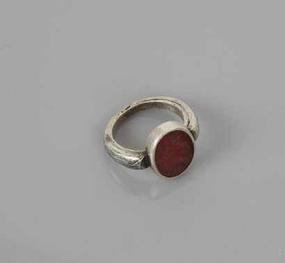 null Silver ring with a carnelian intaglio of a bearded man, probably Jupiter, Roman...