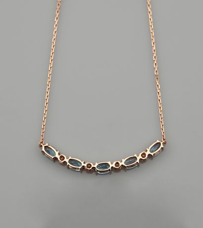 null Pink gold necklace, 750 MM, centered with five topazes interspersed with diamonds,...