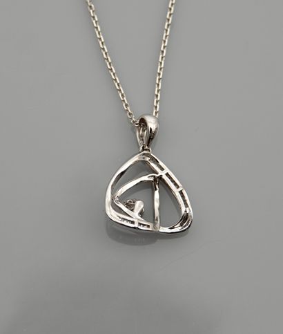 null Chain and pendant in white gold, 750 MM, covered with round and baguette-cut...