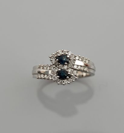 null You and Me ring in white gold, 750 MM, set with two pear-cut sapphires hemmed...