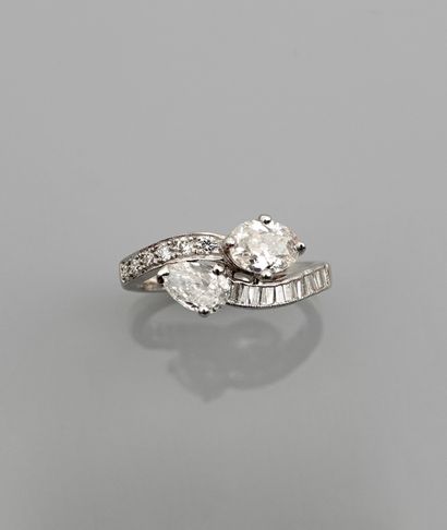 null Ring in white gold, 750 MM, set with two pear-cut diamonds, 0.61 carat and 0.43...