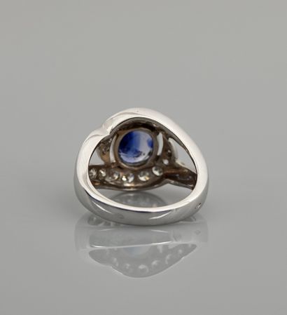null White gold ring, 750 MM, centered with a Ceylon sapphire weighing 2.73 carats...