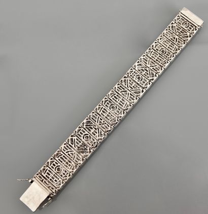 null Flat, articulated bracelet in white gold, 750 MM, covered with round and baguette-cut...