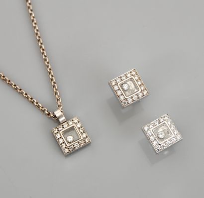 null CHOPARD, HAPPY DIAMONDS. Half set of earrings and necklace in white gold, 750...
