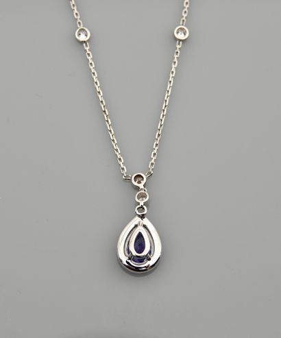 null Diamond necklace in white gold, 750 MM, centered on a pear-cut tanzanite weighing...