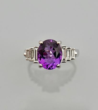 null White gold ring, 750 MM, set with an amethyst weighing about 2.80 carats and...