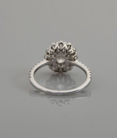 null Ring in white gold, 750 MM, centered with a diamond weighing 0.53 carat accompanied...