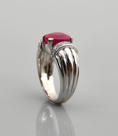 null white gold godron ring, 750 MM, set with a Burmese ruby weighing 4.03 carats...