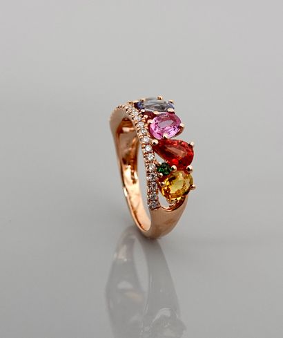 null Ring in pink gold, 750 MM, set with a line of diamonds against nine pear-cut...