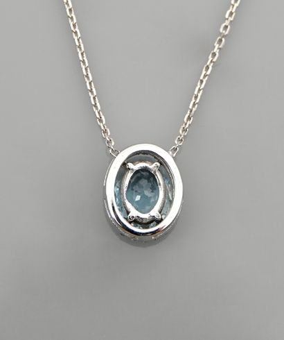 null Necklace in white gold, 750 MM, centered with an aquamarine weighing about 2.50...