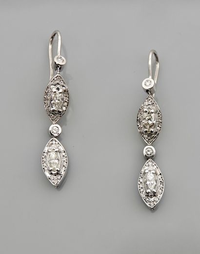 null Earrings in white gold, 750 MM, each adorned with two navette-cut diamonds and...