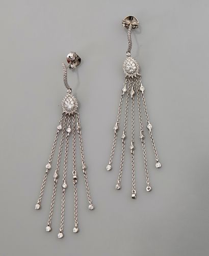 null Earrings in white gold, 750 MM, drawing a flame pattern above a diamond-covered...