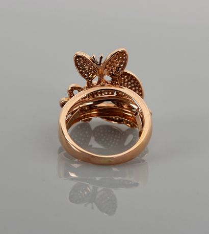 null Pink gold ring, 750 MM, adorned with three butterflies covered with 250 diamonds...