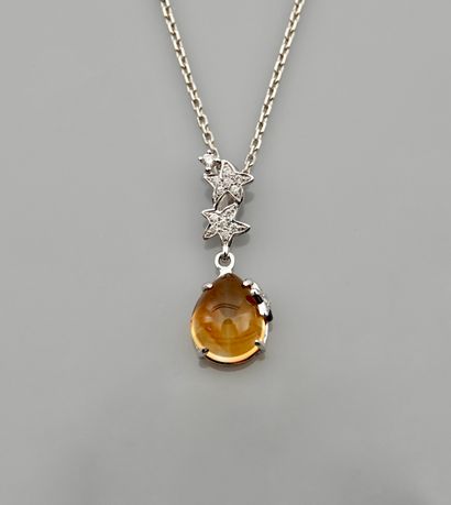 null Chain and pendant in white gold, 750 MM, decorated with a pear-shaped cabochon...