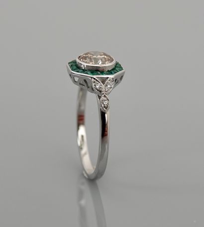 null White gold ring, 750 MM, centered on a diamond weighing 1.06 carats, hemmed...