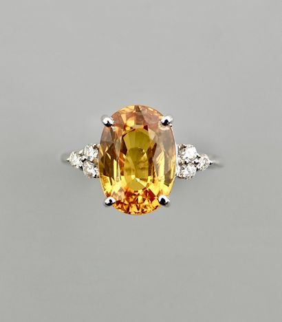 null Ring in white gold, 750 MM, set with a treated yellow sapphire weighing 5.21...