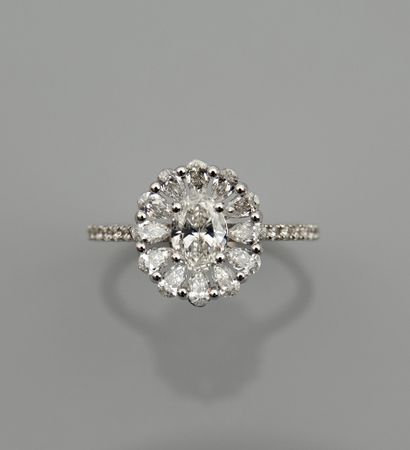 null Ring in white gold, 750 MM, centered with a diamond weighing 0.53 carat accompanied...