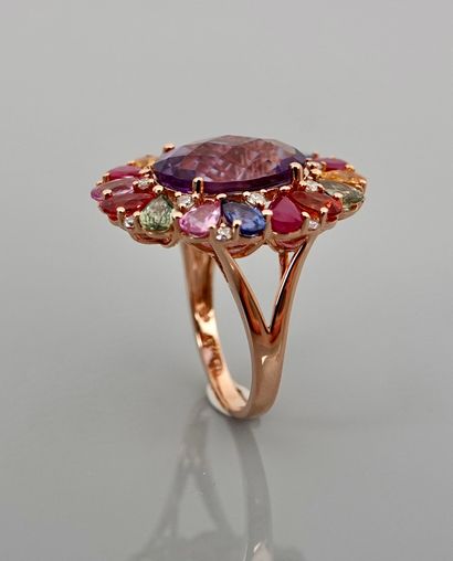 null Yellow gold ring, 750 MM, centered on an oval amethyst weighing about 5 carats...