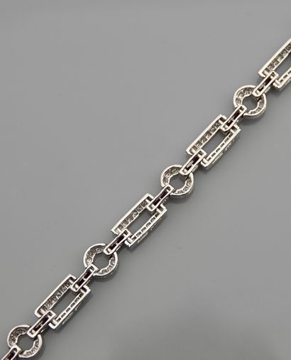 null Bracelet in white gold, 750 MM, formed of round and rectangular links highlighted...