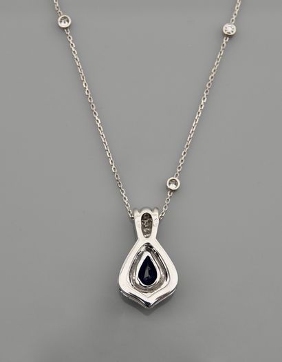 null Diamond chain and pendant in white gold, 750 MM, adorned with a pear-cut sapphire...