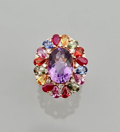 null Yellow gold ring, 750 MM, centered on an oval amethyst weighing about 5 carats...