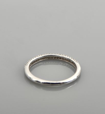 null Half wedding ring in white gold, 750 MM, covered with diamonds in the round,...