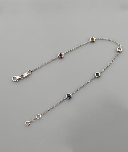 null Bracelet in white gold, 750 MM, punctuated with sapphires, a tsavorite, and...