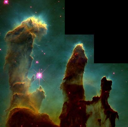 null 
NASA. Historical photograph of the "PILLARS OF CREATION". Star-forming pillars...