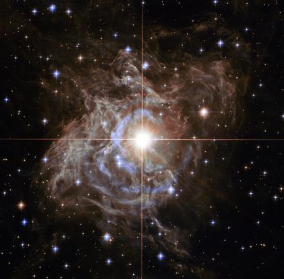 null NASA. GRAND FORMAT. TELESCOPE HUBBLE. Cette image Hubble montre RS Puppis, un...