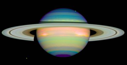 null NASA. Superb photograph of the planet Saturn in deliciously detailed false colors....