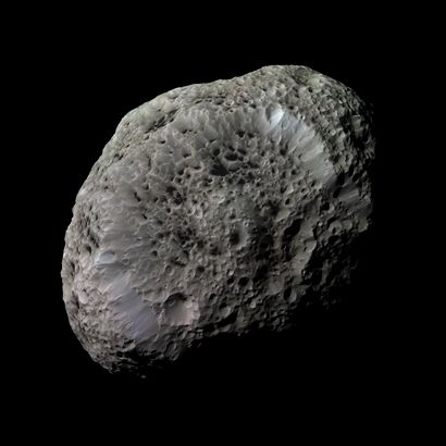 null NASA. LARGE FORMAT. Impressive and rare surreal view of Hyperion, a moon of...