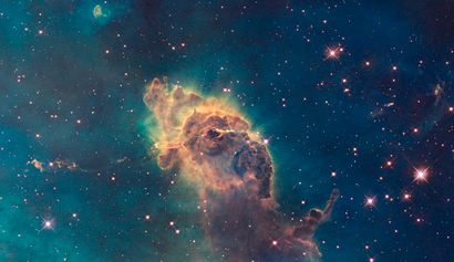 null NASA. LARGE FORMAT. HUBBLE TELESCOPE. Composed of gas and dust, the pillar pictured...