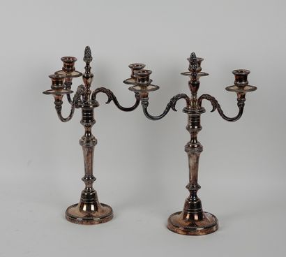 null Pair of three-light torches in silver plated metal

H 36 cm