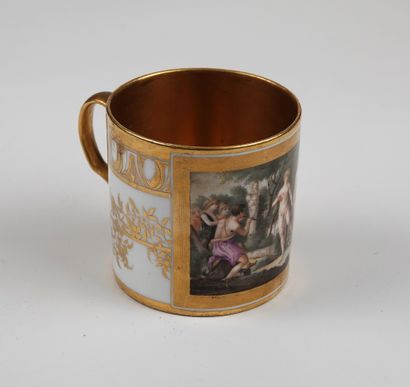 null A cup in porcelain of Paris, with polychrome decoration of ovals and foliage,...