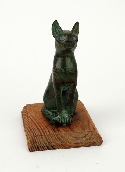 null Statuette representing the goddess Bastet in the form of a cat, decorated with...