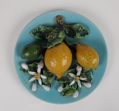 null Polychrome barbotine dish decorated with fruits

Work of the 20th century

Monogrammed...
