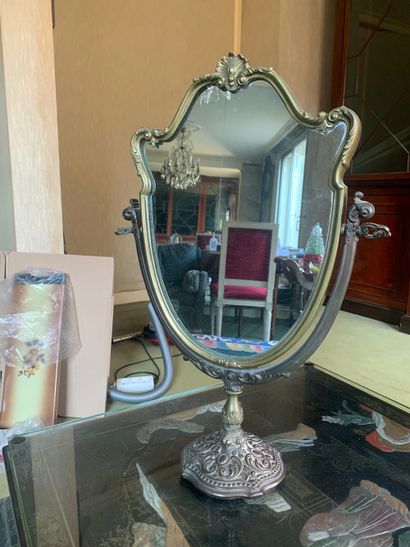 null Mirror of toilet out of silver plated metal in the taste rocaille.

H 51 cm