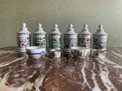null Six spice jars with their lids in Limoge porcelain. 

Two small pots and small...