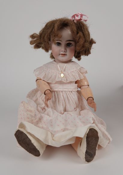 null DEP. Doll with porcelain head

Open mouth, articulated body

Accidents and restoration...