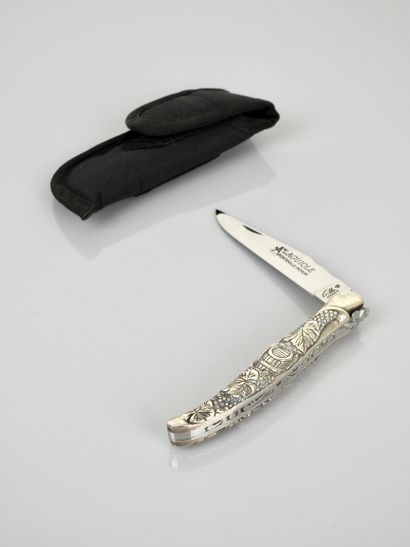 null Laguiole folding knife signed "Gilles", entirely made of steel with grapes decoration....