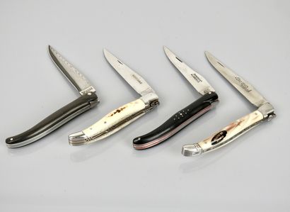 Set of four folding knives with one blade...