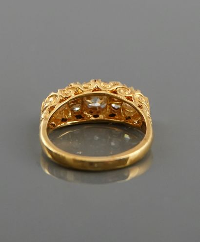 null Bague jarretière en or jaune, 750 MM, ornée d'un diamant pesant 0,55 carat épaulé...