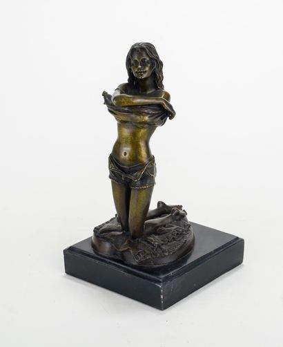 null Kneeling woman, arms crossed 

Bronze with brown patina medal 

Black marble...