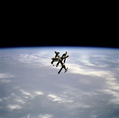 null Nasa. LARGE FORMAT. Superb view of the MIR space station floating above the...