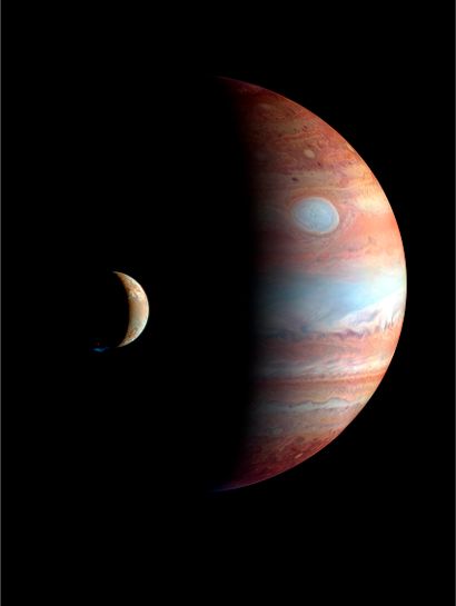 NASA NASA. Montage photographique faisant apparaître les planètes Jupiter et sa lune...