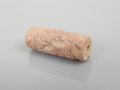 Cylinder seal in white stone decorated with...