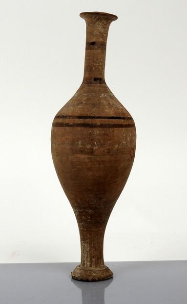 null Amphorisk with high neck decorated with black and brown net

Terracotta 24 cm...
