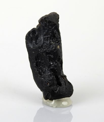 null Tectite variety indochinite

Glass formed after meteorite impact on Earth. 5,5cm

Certificate...
