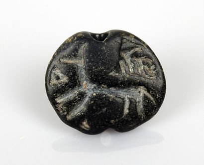 A bead seal decorated with an animal

Chlorite...
